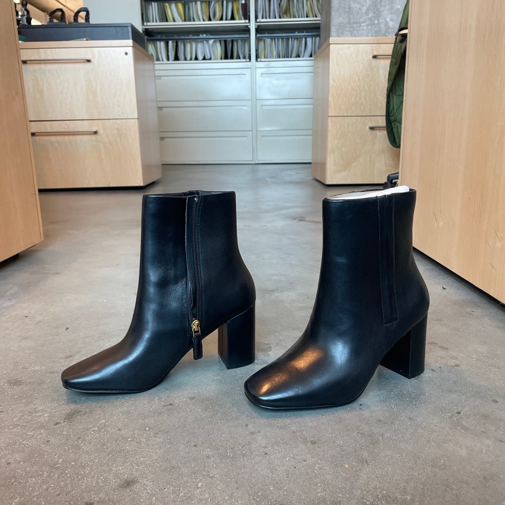 black cole haan heeled booties. never worn, only to try on.